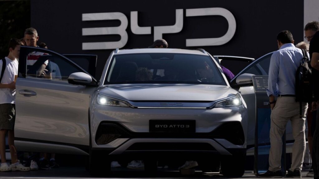 AP photo about visitors watch the BYD ATTO 3 at the IAA motor show in Munich, Germany, Friday, Sept. 8, 2023